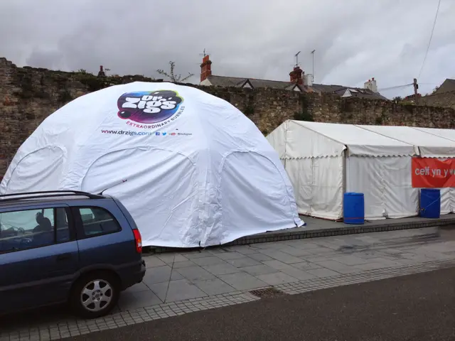 Psychedelic Bubble-Dome: the white Bubble-Dome standing in a Conwy street beside the old town walls